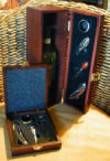Wine presentation gift boxes - you may send wine or champagne in these sleek boxes. Vintners tools are included.